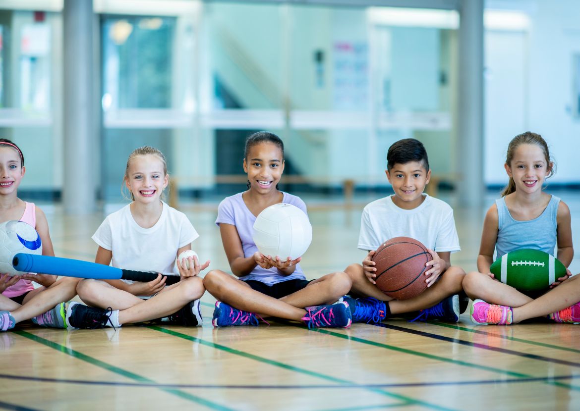 Kids with sports equipment
